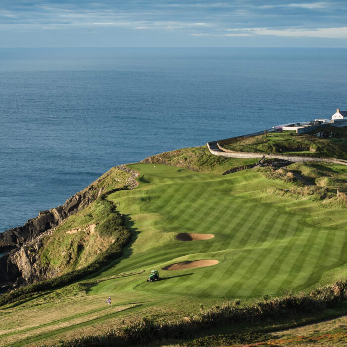 Old Head Golf Links Hole 4: Razor's Edge, Kinsale, Co. Cork - dramatic coastal cliffs and pristine fairways.